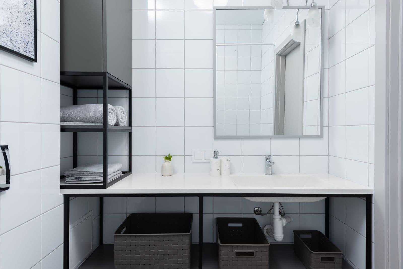 Tiled bathroom with built-in storage